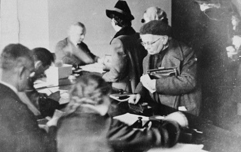 Jews register for identification papers and work permits in the offices of the Jewish Council in the Krakow ghetto